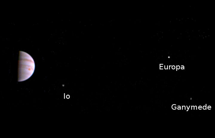 An image of Jupiter and three of its largest moons taken on from Juno as it entered orbit on July 4. 