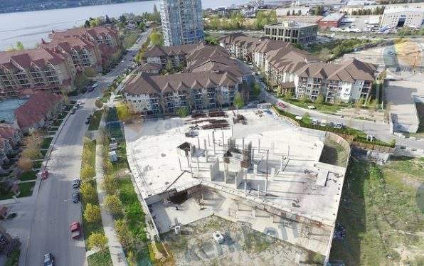 Aerial view of the current construction site for 1151 Sunset Drive in Kelowna.