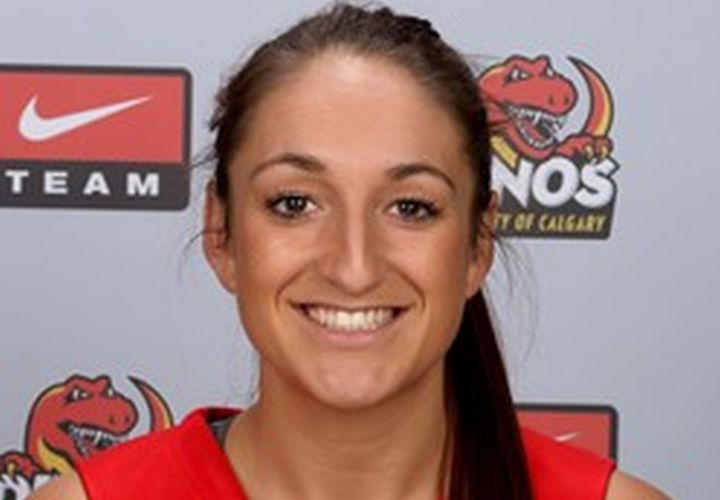 Kristie Sheils, an assistant coach with the University of Calgary's Junior Dinos basketball program, has been charged with one count of sexual exploitation.