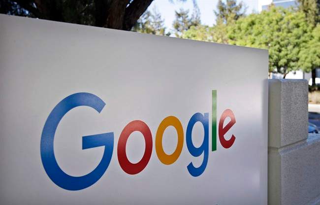 This shows a sign outside Google headquarters in Mountain View, Calif. 