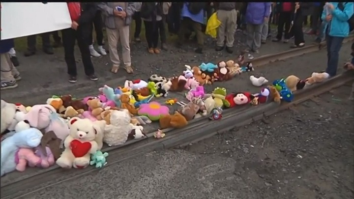 Stuffed animals are put on the train tracks in Lac-Megantic as a symbolic gesture. Sunday, July 10, 2016.