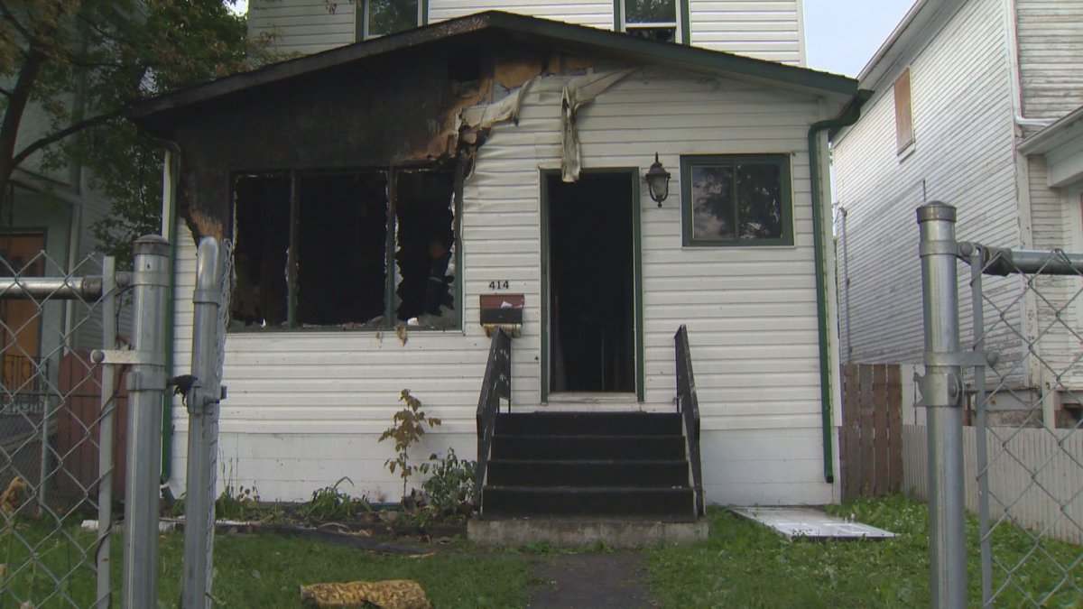 Two women were saved from this Winnipeg home Tuesday after a fire trapped them on the second floor. 