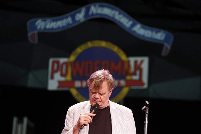 FILE - In this June 24, 2016, file photo, "A Prairie Home Companion" host Garrison Keillor rehearses with the band at Tanglewood in Lenox, Mass.