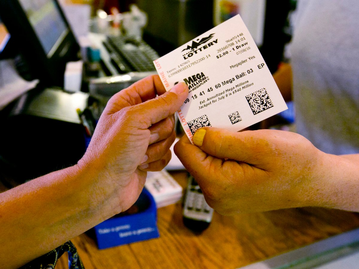 A customer purchases a lottery ticket at a store in this July 8, 2016 file photo.