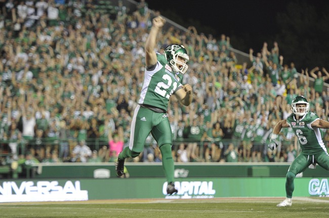 Saskatchewan Roughriders kicker Tyler Crapigna celebrates after kicking the game-winning field goal against the Ottawa Redblacks during CFL action in Regina on Friday, July 22, 2016.