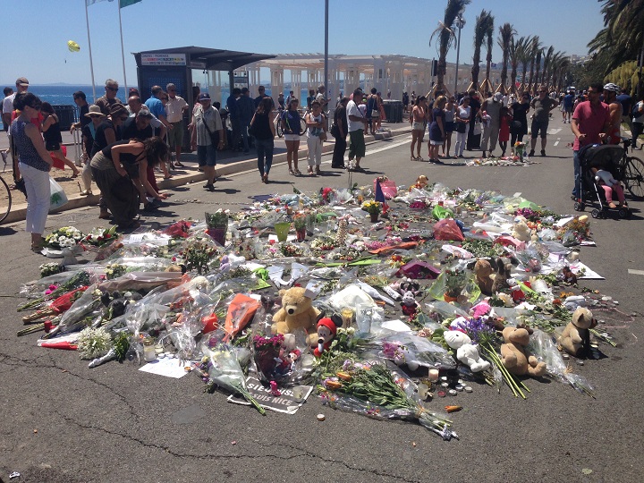 Flowers at a makeshift memorial on the Promenade des Anglais in Nice, France. Sunday, July 17, 2016.