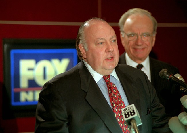 In this Jan. 30, 1996 file photo, Roger Ailes, left, speaks at a news conference as Rupert Murdoch looks on after it was announced that Ailes will be chairman and CEO of Fox News. 