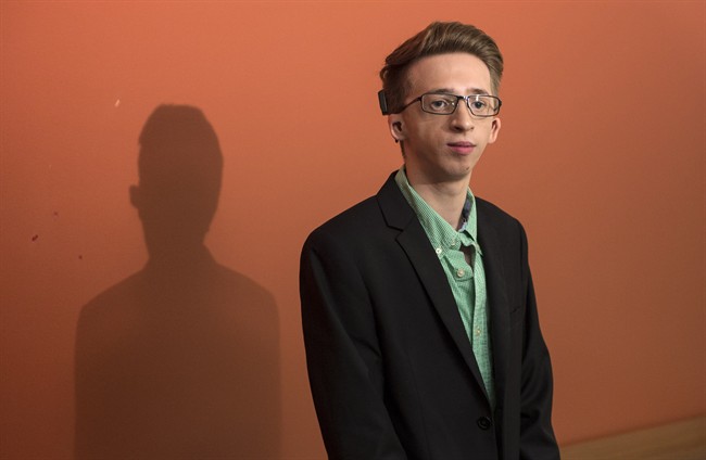 Jeremy Gabriel arrives at a news conference Thursday, July 21, 2016 in Montreal. Quebec comedian Mike Ward has been ordered to pay $35,000 in moral and punitive damages to a young artist for jokes about his singing and his disfigurement.