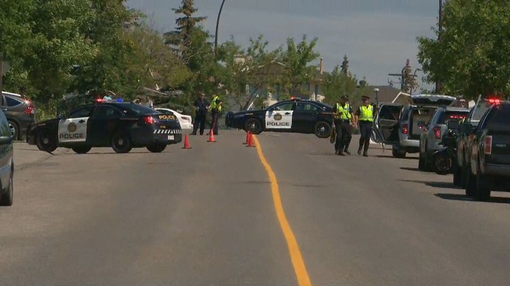 Calgary police respond to a collision along Hawkwood Drive N.W. on Thursday, July 28, 2016. 