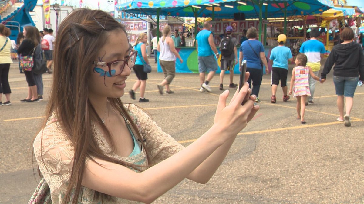 Guests play Pokemon Go at K-Days July 23, 2016.