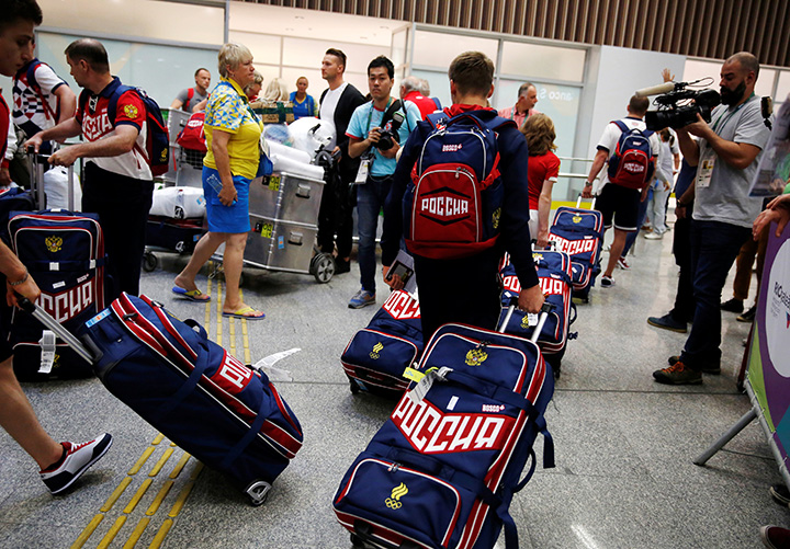 Members of Russia's Olympic team arrive at the airport in Rio de Janeiro, Brazil, July 24, 2016. 