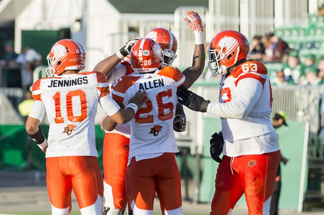The B.C. Lions celebrate a touchdown against the Saskatchewan Roughriders during second half CFL action in Regina on Saturday, July 16th, 2016.