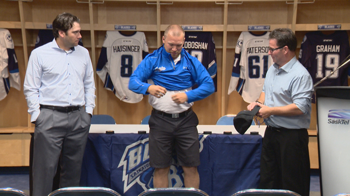Saskatoon Blades head coach Dean Brockman (right) with his new assistant coaches Bryce Thoma (left) and Ryan Keller (centre).