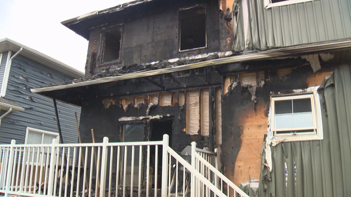 Officials say a house fire in Saskatoon was caused by the improper disposal of smoking material.