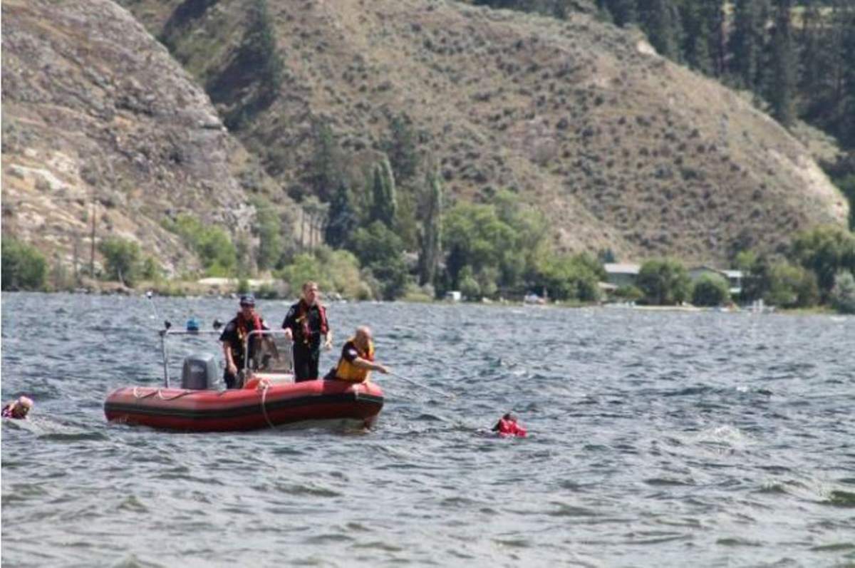 A file photo of rescue crews on Skaha Lake on Sunday, July 3, 2016 when a man was pulled from the water near the same spot where the B.C. day long weekend drowning happened.