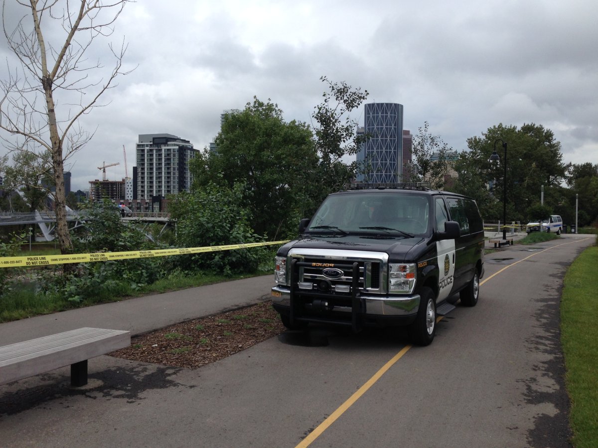 Calgary police taped off on area along the Bow River near St. Patrick's Island on July 14, 2016 after a body was discovered in the water.