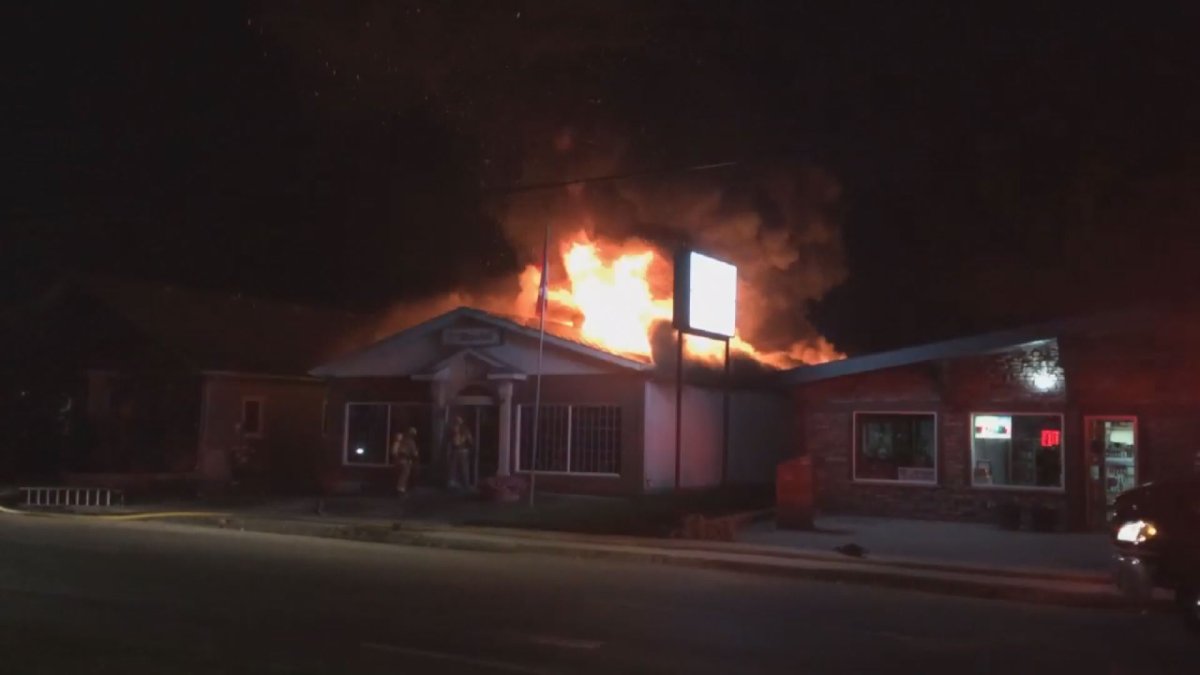 Patricia McPherson with the In Seine Newsletter recorded video of Ste. Anne's Jovial Club engulfed in flames Saturday night.