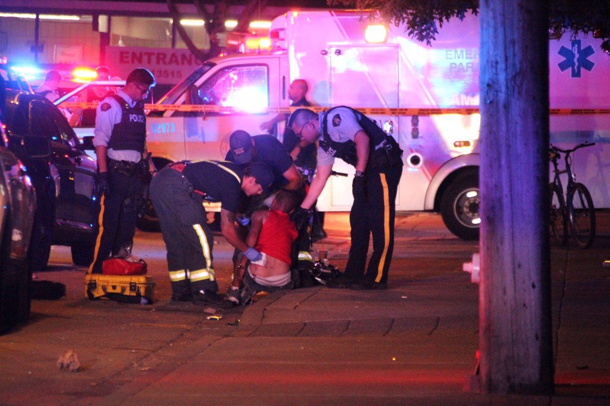 One of the victims on the ground following a shooting in Surrey early Thursday morning.