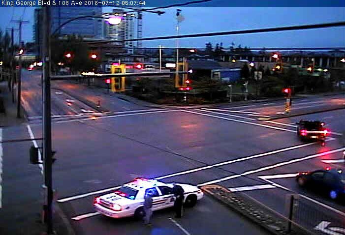 Surrey RCMP on scene at the intersection of 108 Avenue and King George Boulevard on July 12, 2016.