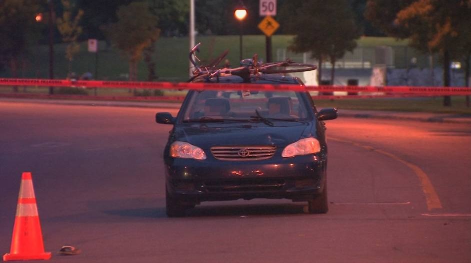 A 15-year-old boy's bicycle can be see on the roof of a car after a collision Friday night. The teenager is recovering in hospital. Saturday, July 9, 2016.