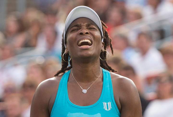 Venus Williams of the United States reacts during her match against Madison Keys of the United States during third round of play at the Rogers Cup tennis tournament on Thursday July 28, 2016 in Montreal. 