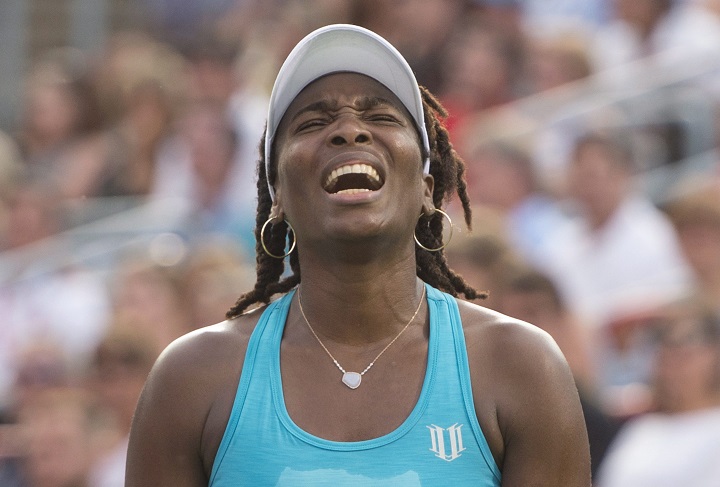 Venus Williams of the United States reacts during her match against Madison Keys of the United States during third round of play at the Rogers Cup tennis tournament on Thursday July 28, 2016 in Montreal. 