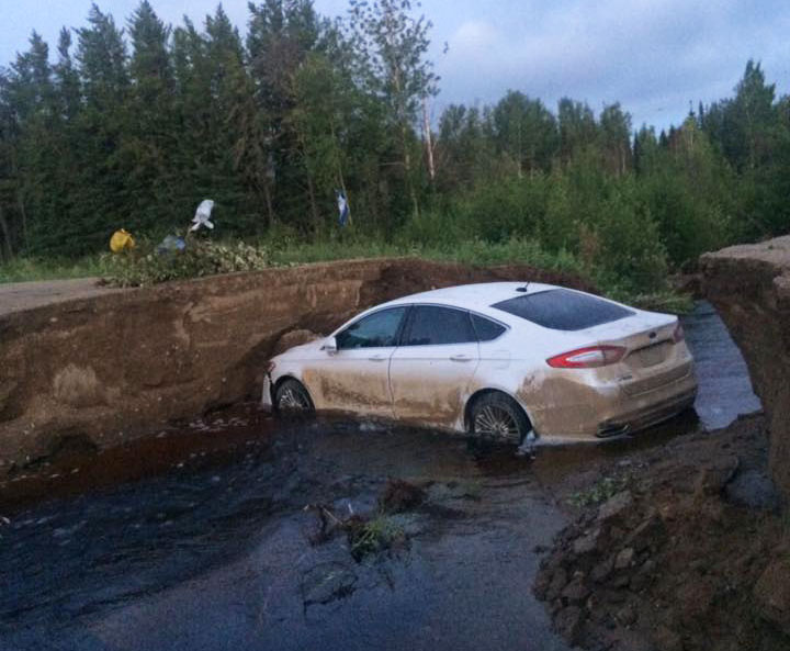 A car ended up in a washed out portion of Highway 165 in northern Saskatchewan.