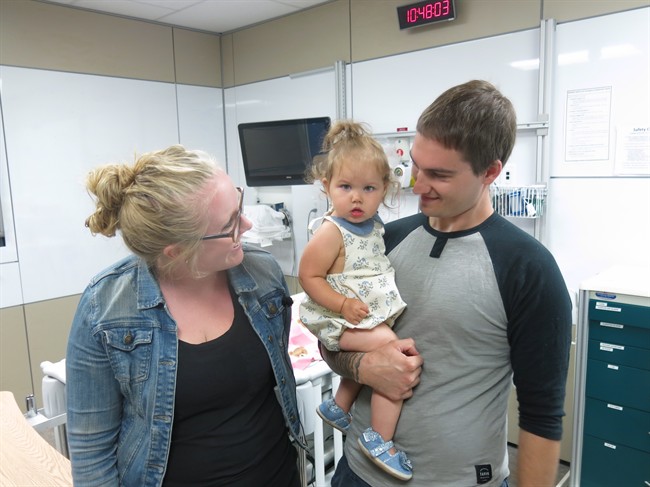 Katie Kaminski, her daughter Tegan and partner Curtis de Vries can attest to the benefits of therapeutic hypothermia. Shortly after their daughter Tegan in this photo taken Monday, July 25, 2016. Tegan was deprived of oxygen at birth and was kept in a cooling blanket for 72 hours until her condition improved. 