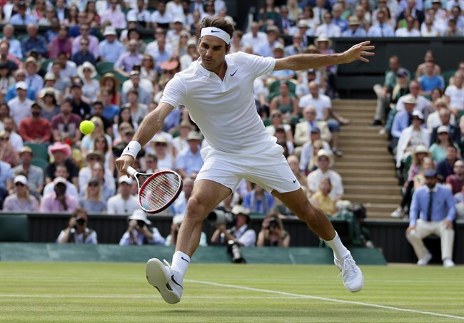 Roger Federer of Switzerland plays a return to Marin Cilic of Croatia during their men's singles match on day ten of the Wimbledon Tennis Championships in London, Wednesday, July 6, 2016.