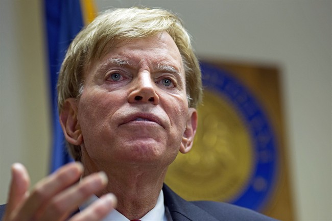 In this July 22, 2016, photo, former Ku Klux Klan leader David Duke talks to the media at the Louisiana Secretary of State's office in Baton Rouge, La.