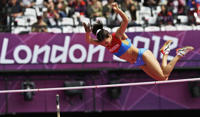 In this Aug. 4, 2012 file picture Russia's Yelena Isinbayeva competes in a women's pole vault qualification round during the athletics in the Olympic Stadium at the 2012 Summer Olympics, London. The Court of Arbitration for Sport was scheduled to issue a verdict Thursday July 21, 2016 in the case of 68 Russian track and field athletes seeking to overturn the ban imposed by the IAAF following allegations of state-sponsored doping and cover-ups.