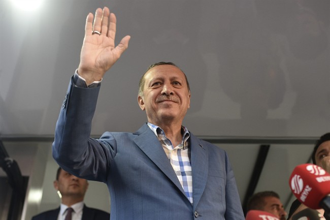 Turkish President Recep Tayyip Erdogan delivers a speech n Istanbul, Saturday, July 16, 2016. Forces loyal to Erdogan quashed a coup attempt in a night of explosions, air battles and gunfire that left some hundreds of people dead and scores of others wounded Saturday. The chaos Friday night and Saturday came amid a period of political turmoil in Turkey _ a NATO member and key Western ally in the fight against the Islamic State group _ that critics blame on Erdogan's increasingly authoritarian rule. (AP Photo).