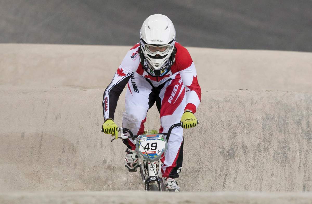 Tony Nyhaug of the Canada rides to second place in the Men Elite competition at the BMX Supercross World Championships, Manchester, England, Friday, April 19, 2013.