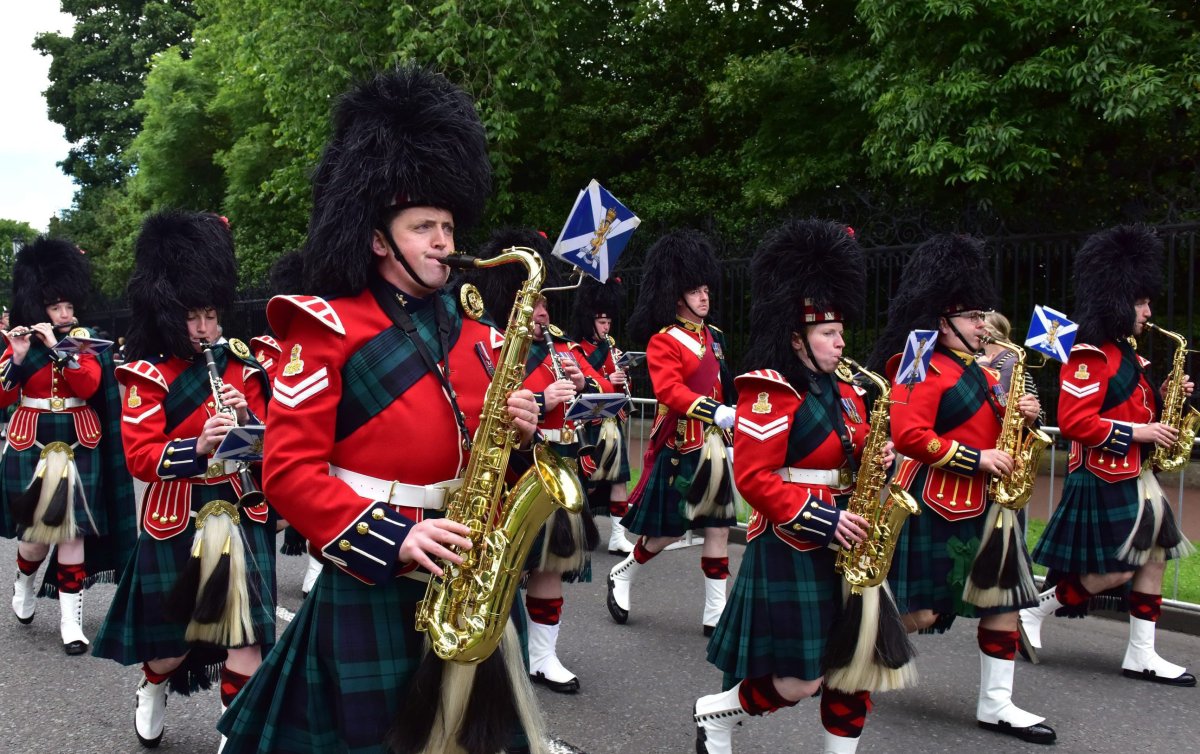 A parade with the pipes and drums of the Black Watch 3rd battalion the Royal Regiment of Scotland.