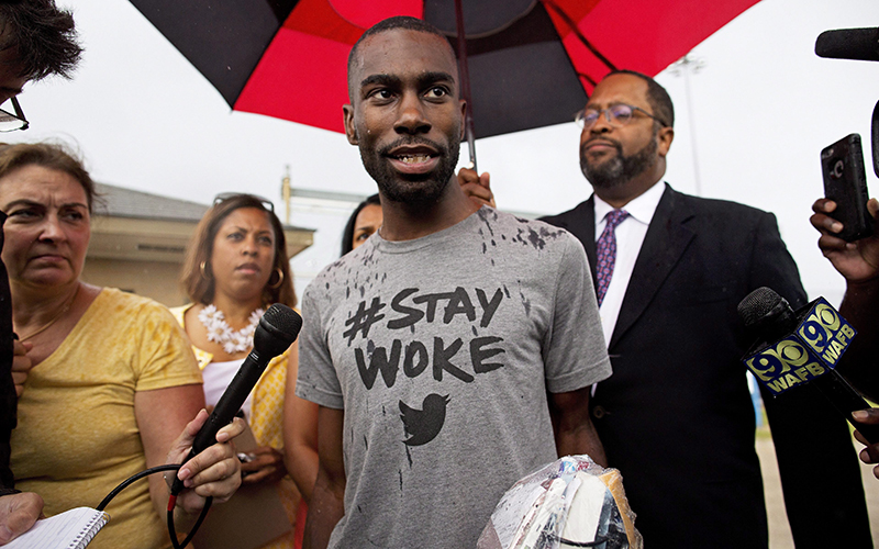 Black Lives Matter activist DeRay Mckesson talks to the media after his release from the Baton Rouge jail in Baton Rouge, La. on Sunday, July 10, 2016. 