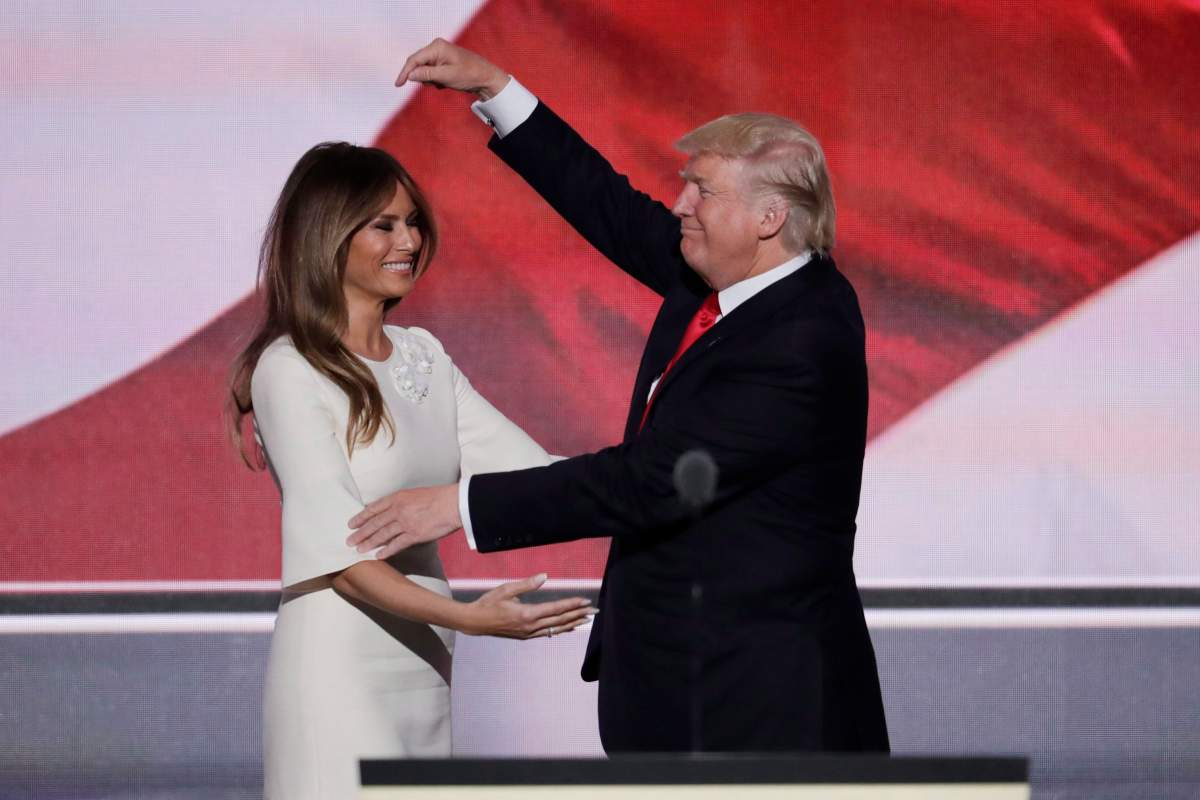 Republican Presidential Candidate Donald Trump points to his wife Melania after speaking during the final day of the Republican National Convention in Cleveland, Thursday, July 21, 2016. 