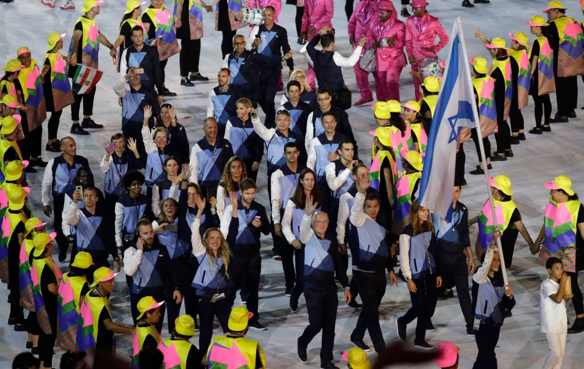 Neta Rivkin carries the flag of Israel during the opening ceremony for the 2016 Summer Olympics in Rio de Janeiro, Brazil, Friday, Aug. 5, 2016.
