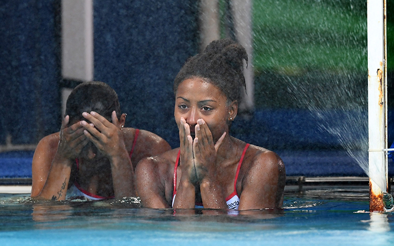 Jennifer Abel and Pamela Ware of Canada sit dejected during the Women's Synchronised 3m Springboard competition of the Rio 2016 Olympic Games Diving events at the Maria Lenk Aquatics Centre in the Olympic Park in Rio de Janeiro, Brazil, 07 August 2016. 