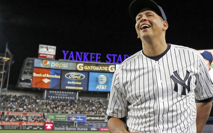 New York Yankees' Alex Rodriguez holds a baseball as he laughs during an interview following his final baseball game as a Yankee player, against the Tampa Bay Rays at Yankee Stadium in New York, Friday, Aug. 12, 2016. The Yankees won 6-3.