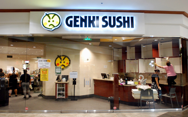Employees clean the Genki Sushi conveyor belt restaurant chain in Aiea, Hawaii. U.S. Food and Drug Administration tests found hepatitis A in scallops from the Philippines, which have been identified as the likely source of a Hawaii outbreak of the virus. 