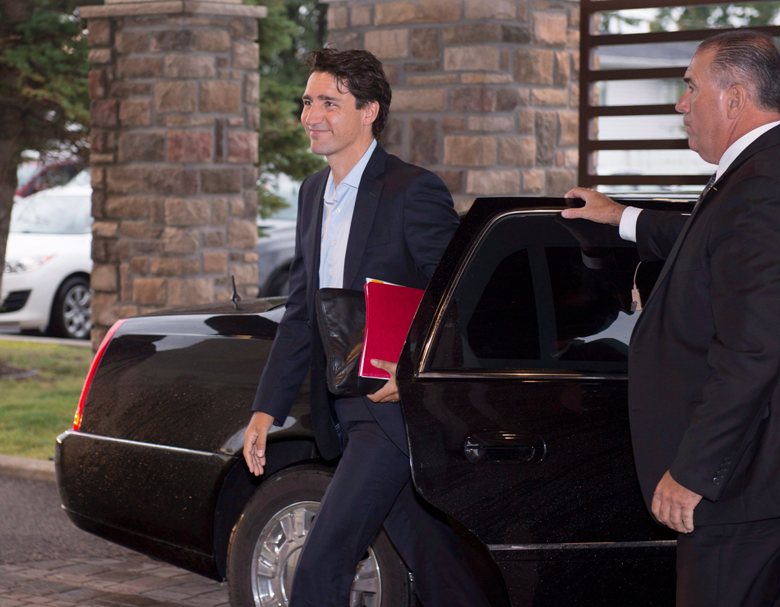 Prime Minister Justin Trudeau arrives at the beginning of a two-day caucus meeting in Saguenay Que. on Thursday, August 25, 2016.