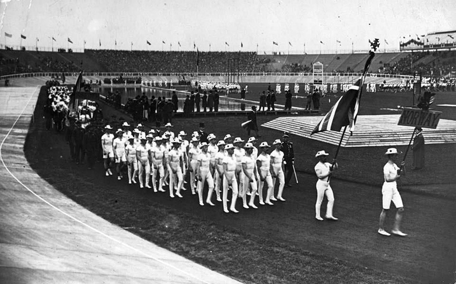 Norwegian and Swedish competitors march past the Royal Box during the opening ceremony of the 1908 London Olympics.