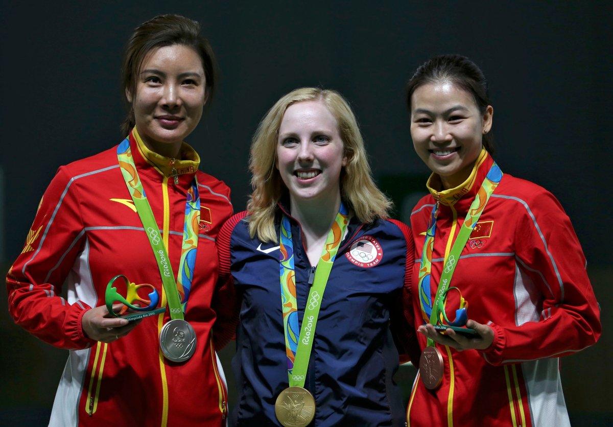 2016 Rio Olympics - Shooting - Victory Ceremony - Women's 10m Air Rifle Victory Ceremony - Olympic Shooting Centre - Rio de Janeiro, Brazil - 06/08/2016. (L-R) Du Li (CHN) of China (PRC), Virginia Thrasher (USA) of USA and Yi Siling (CHN) of China (PRC) pose with their medals. 