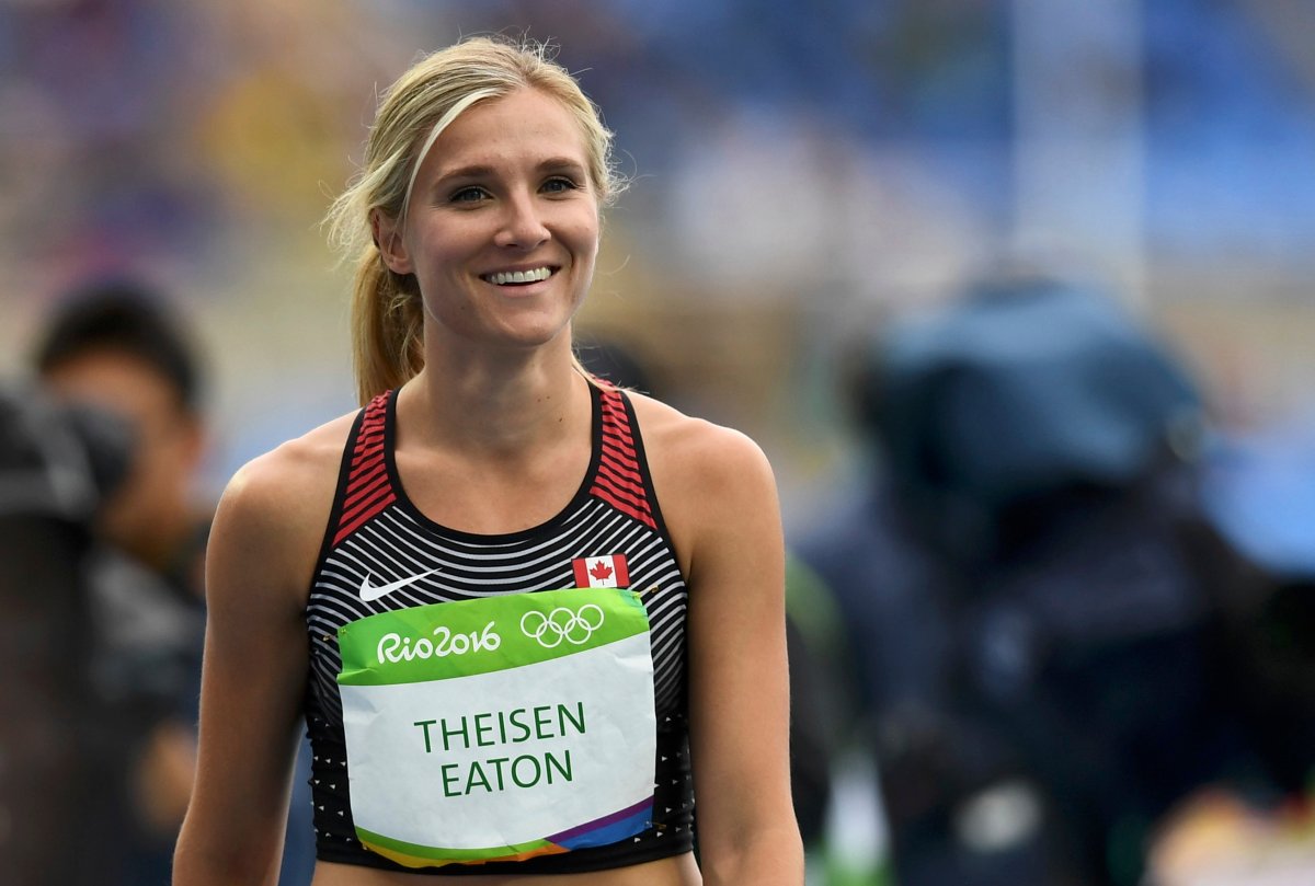 Brianne Theisen-Eaton of Canada reacts after her jump in women's heptathelon.  