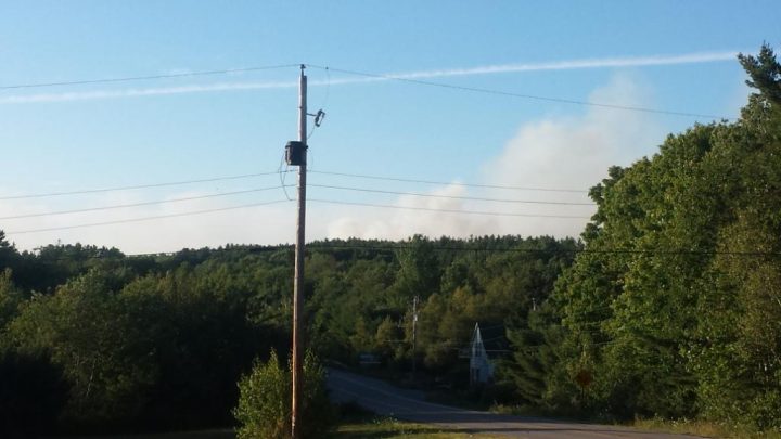 Smoke is seen on the horizon over Maitland Bridge, N.S. Two out-of-control wildfires are burning in the area. 