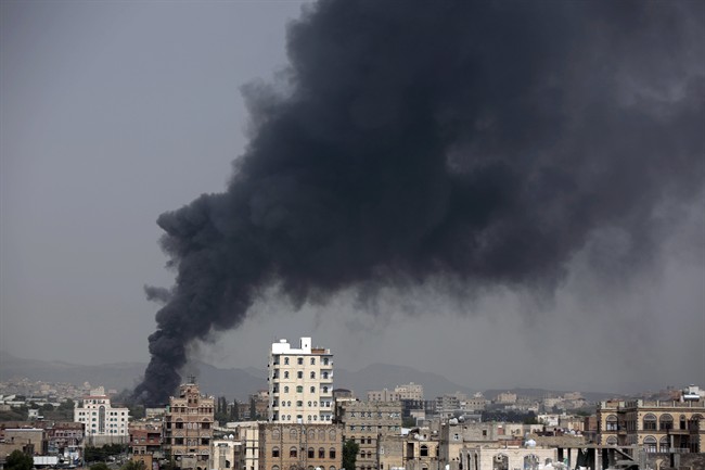 Smoke rises after Saudi-led airstrikes hit a food factory in Sanaa, Yemen, Tuesday, Aug. 9, 2016. U.N. officials say four out of five Yemenis are in need of humanitarian assistance.
