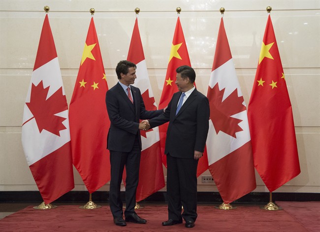 Chinese President Xi Jinping welcomes Canadian Prime Minister Justin Trudeau to the Diaoyutai State Guesthouse in Beijing, Wednesday August 31, 2016. China has rejected Canada's efforts to inject labour standards into a free trade agreement.