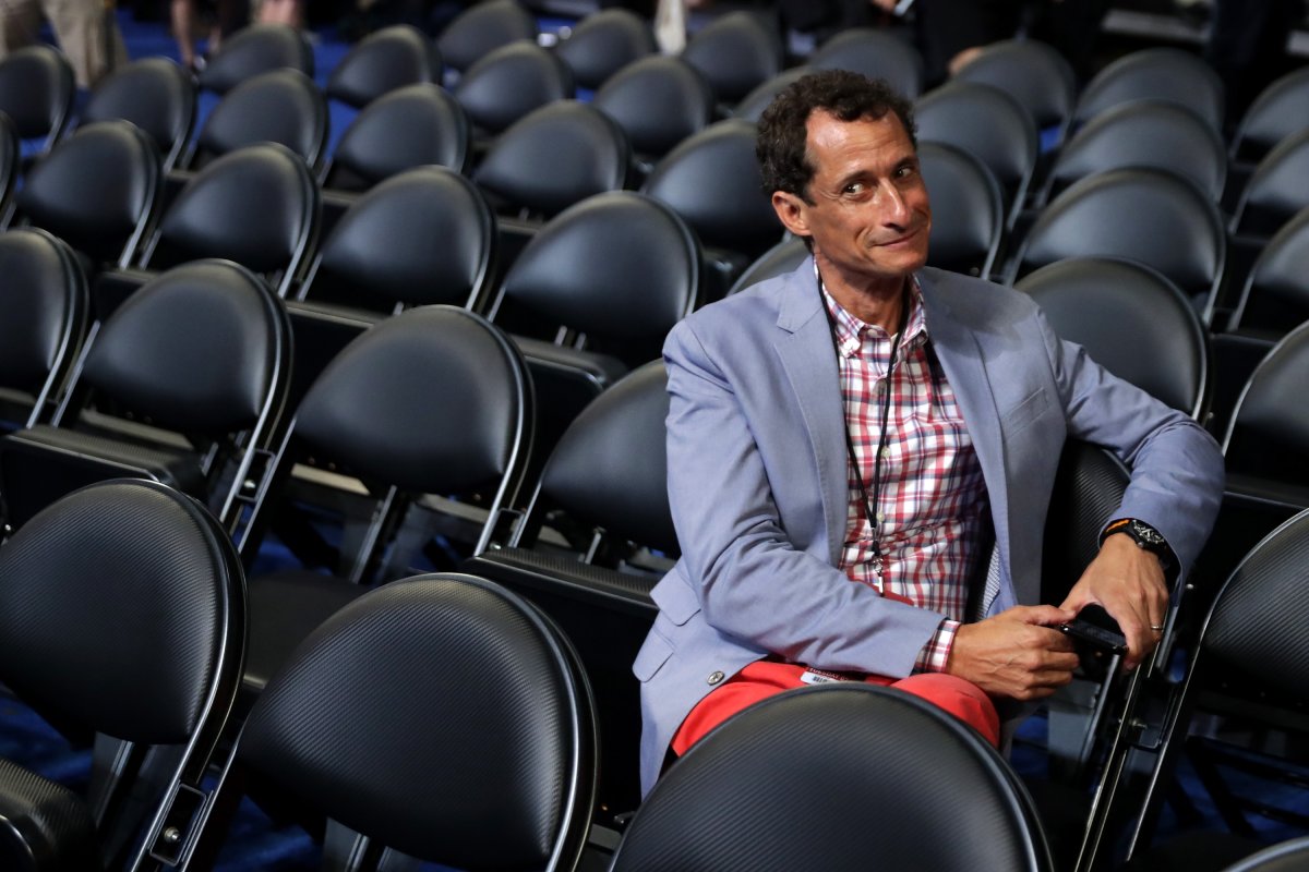 Former New York congressman Anthony Weiner on the second day of the Democratic National Convention at the Wells Fargo Center, July 26, 2016 in Philadelphia, Pennsylvania holding his cellphone.