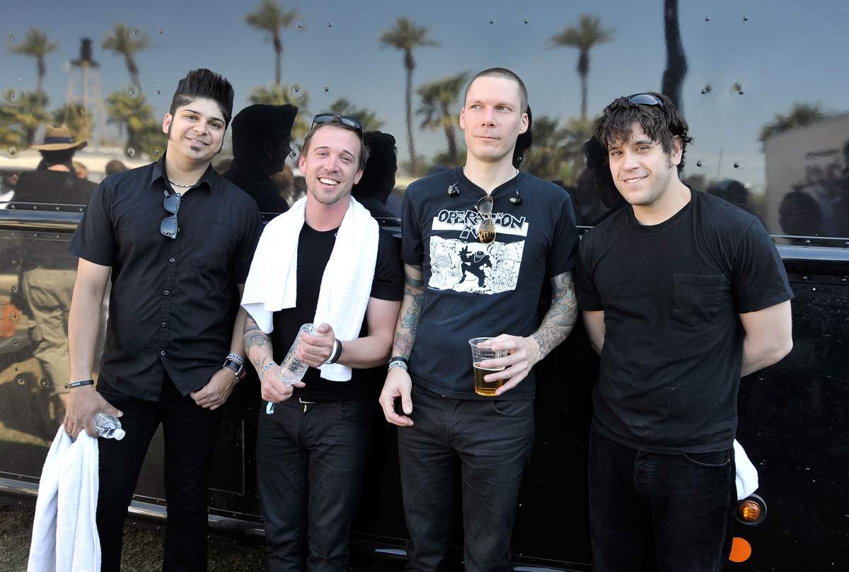Musicians Ian D'Sa, Ben Kowalewicz, Aaron Solowoniuk, and Jon Gallant of Billy Talent pose backstage during day two of the Coachella Valley Music & Arts Festival 2009 held at the Empire Polo Club on April 18, 2009 in Indio, California. 