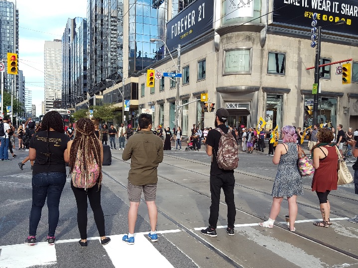 Black Lives Matter Toronto protesters block the intersection of Yonge and Dundas on Aug. 15, 2016.